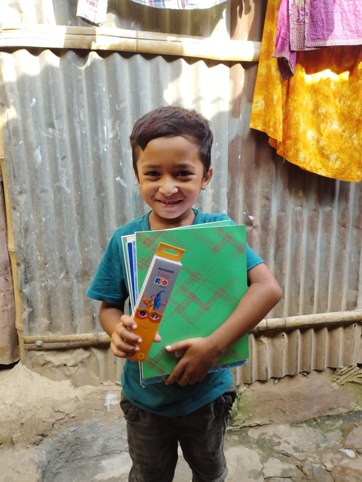 Refiat received books from our caretaker